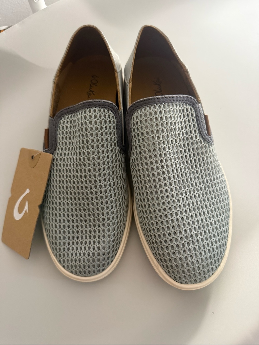 Olukai women's Slip-On Sneaker in Light Gray